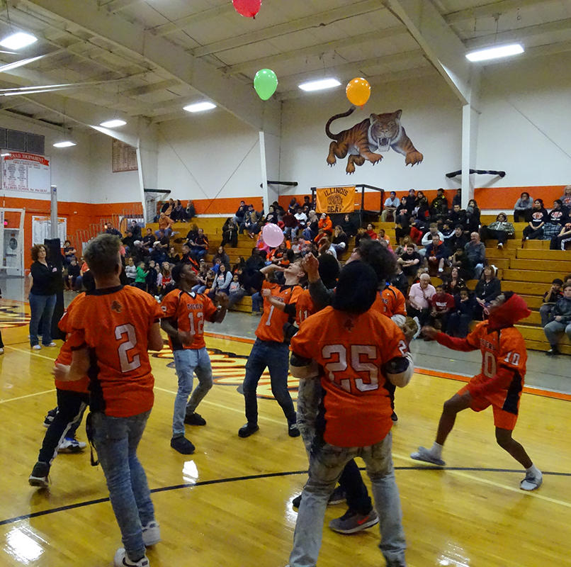 Students participating in pep rally games.
